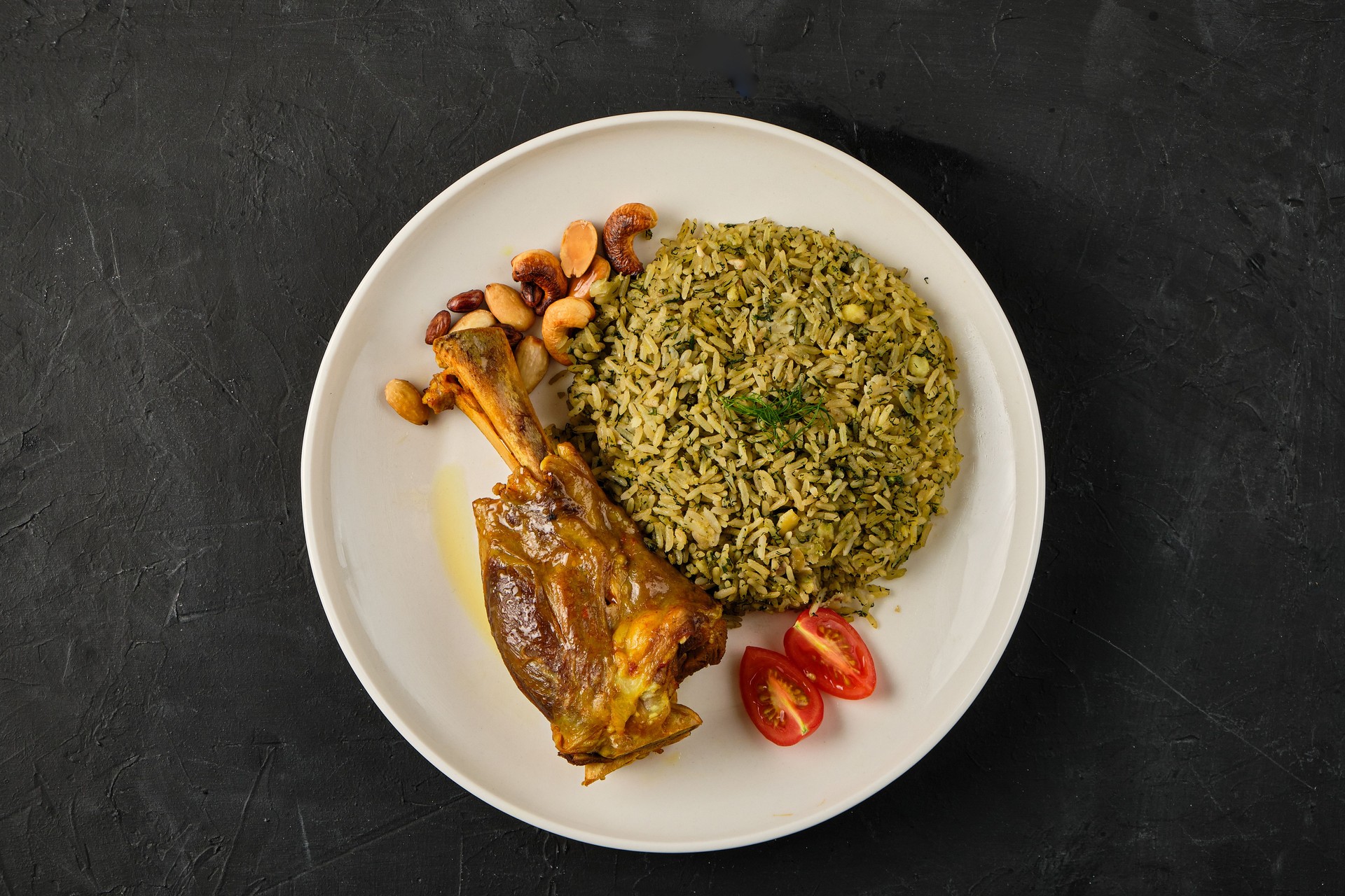 Mansaf al-Quzi with nuts and lamb meat, rice with meat and nuts